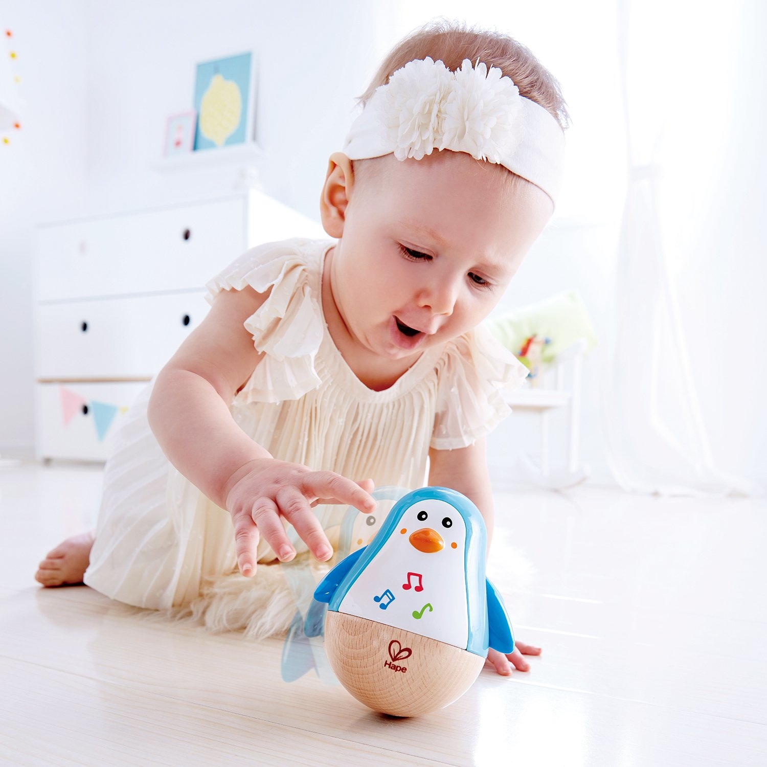 Hape E0331 Stehauf-Pinguin mit Klang